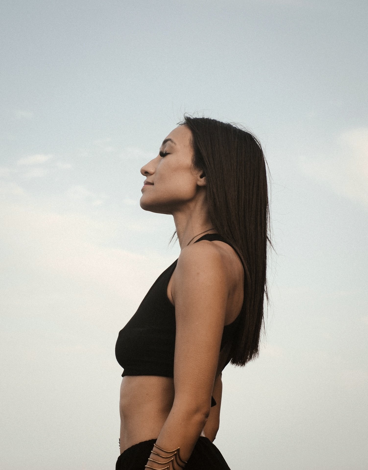 Consciousness Expansion — Mona Hassan profile against the sky